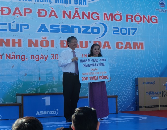 Vận động hơn 1,2 tỉ đồng làm từ thiện thông qua giải đua xe đạp - Ảnh 5.