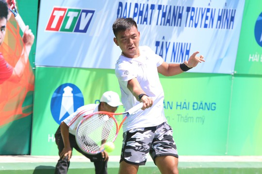 Lý Hoàng Nam đánh bại bản sao John Isner, vào bán kết F4 Vietnam - Ảnh 1.