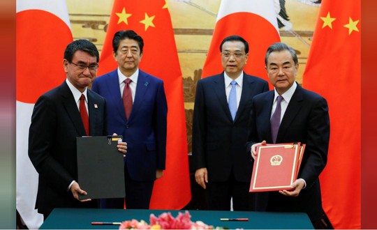 Ông Donald Trump đẩy Trung - Nhật lại gần nhau - Ảnh 1. Ông Donald Trump đẩy Trung - Nhật lại gần nhau - Ảnh 1.