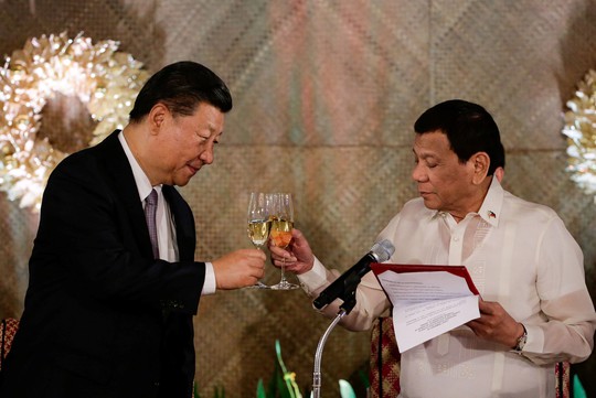 Philippines ký thỏa thuận thăm dò dầu khí với Trung Quốc - Ảnh 1.