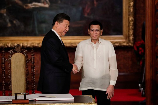 Philippines ký thỏa thuận thăm dò dầu khí với Trung Quốc - Ảnh 3.
