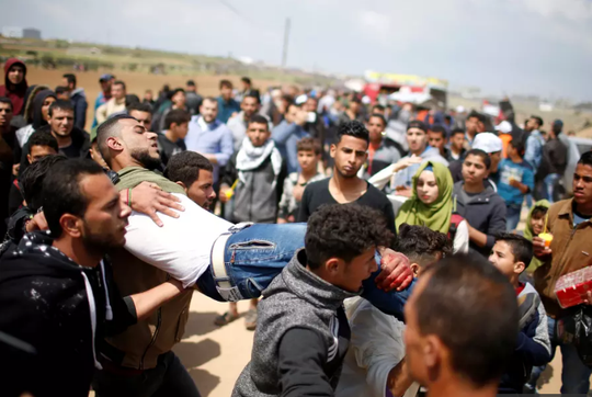 Đụng độ đẫm máu ở Dải Gaza, hơn 1.000 người thương vong - Ảnh 5.