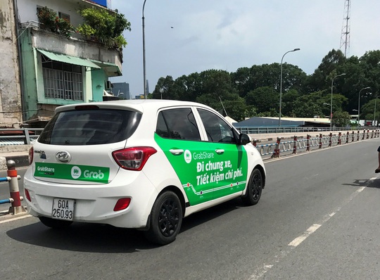 Grab, Uber nói gì sau ý kiến của Bộ trưởng GTVT? - Ảnh 1.