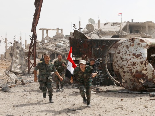 Quân đội Syria siết vòng vây quanh trại tị nạn Palestine - Ảnh 1.