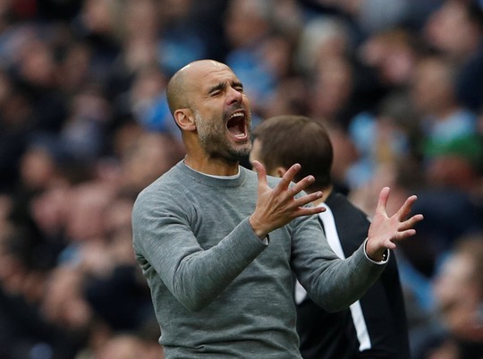 HLV Guardiola đau buồn sau trận thua ngược M.U - Ảnh 1.