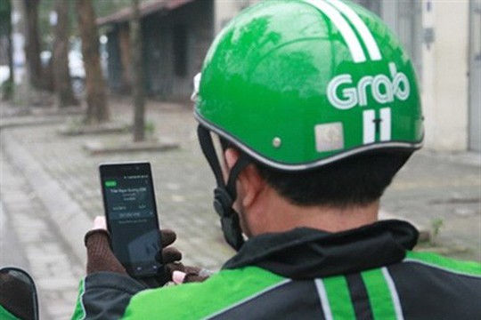 Grab bị điều tra, ứng dụng gọi xe Singapore chuẩn bị ra mắt - Ảnh 1.