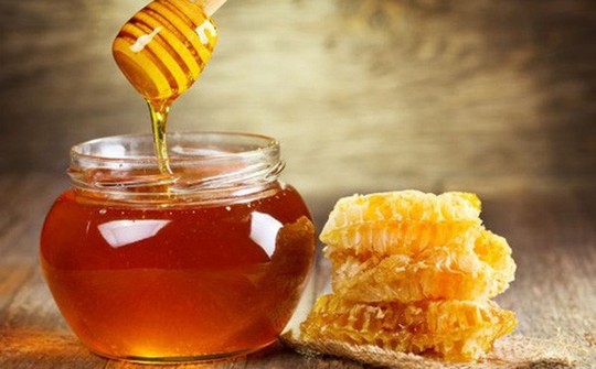 Mật ong Việt Nam xuất khẩu với giá thấp nhất thế giới - Ảnh 1.