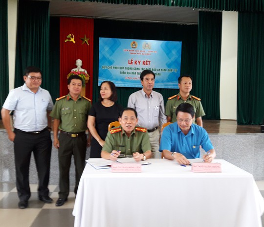 LĐLĐ TP Đà Nẵng và Công an ký kết Quy chế phối hợp an ninh trật tự - Ảnh 1. LĐLĐ TP Đà Nẵng và Công an ký kết Quy chế phối hợp an ninh trật tự - Ảnh 1.