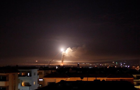 Syria lại tuyên bố bắn hạ hầu hết tên lửa Israel trong đêm - Ảnh 1. Syria lại tuyên bố bắn hạ hầu hết tên lửa Israel trong đêm - Ảnh 1.
