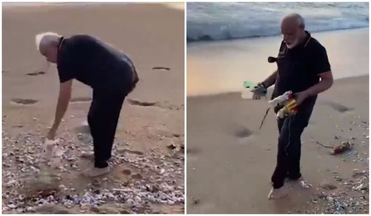 Thủ tướng Ấn Độ không ngại nhặt rác 30 phút trên bãi biển - Ảnh 2.