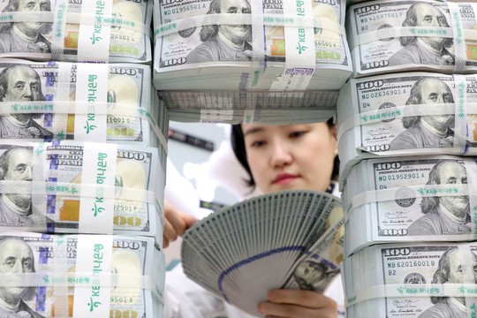 Các siêu cường đe dọa vị thế đồng USD - Ảnh 1.
