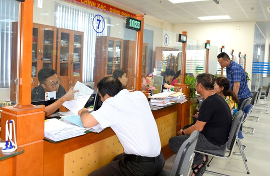 Cơ quan bảo hiểm chủ động gia hạn thẻ BHYT - Ảnh 1.