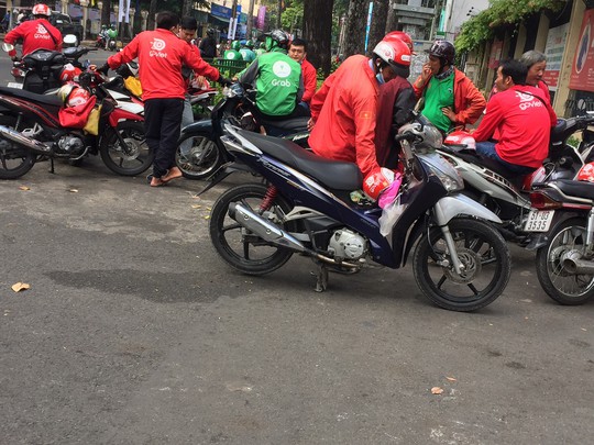 Grab lý giải về việc thay đổi cách tính cước xe ôm GrabBike - Ảnh 1.