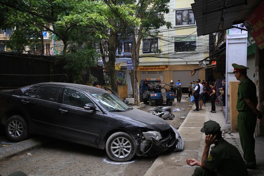 Bất ngờ thân thế người phụ nữ chạy Camry lùi xe tông chết người - Ảnh 1.