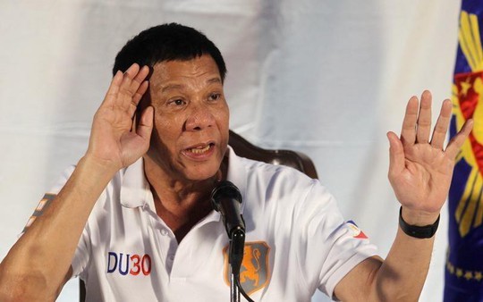 Ông Duterte thách Mỹ tuyên chiến với Trung Quốc trên biển Đông - Ảnh 1.