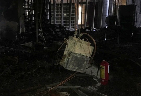 Hiện trường vụ cháy tòa nhà dầu khí Thanh Hóa khiến 2 người chết, 13 người bị thương - Ảnh 9.