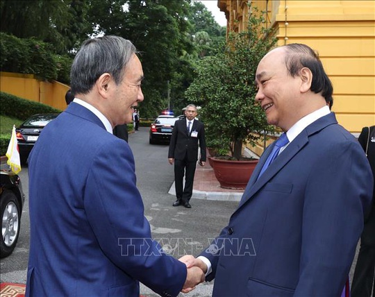 Thủ tướng Nguyễn Xuân Phúc chủ trì lễ đón Thủ tướng Nhật Bản - Ảnh 3.