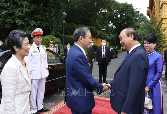 Thủ tướng Nguyễn Xuân Phúc chủ trì lễ đón Thủ tướng Nhật Bản - Ảnh 2.