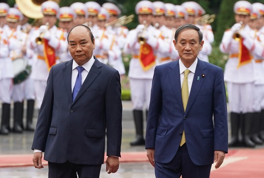 Thủ tướng Nguyễn Xuân Phúc chủ trì lễ đón Thủ tướng Nhật Bản - Ảnh 1.