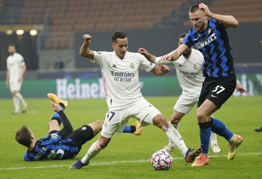 Thẻ đỏ tai hại, Inter Milan trắng tay trước Real Madrid trên sân nhà - Ảnh 1.