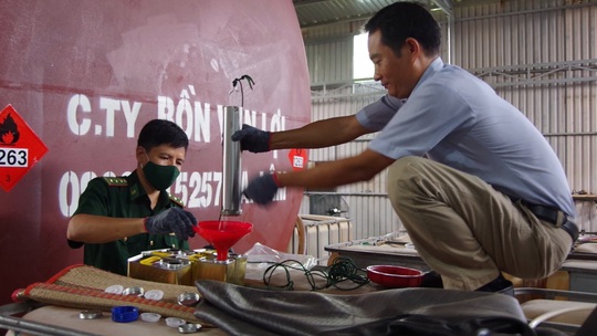 Hàng ngàn lít xăng giả tại Vũng Tàu được sản xuất như thế nào? - Ảnh 3.