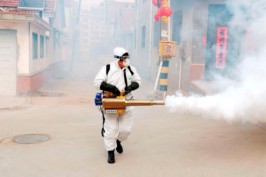 Thế giới trong vòng xoáy virus corona: Những bức hình ám ảnh - Ảnh 4.