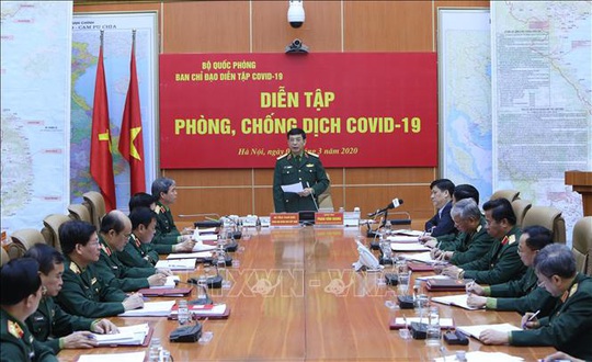 Cận cảnh quân đội diễn tập phòng, chống dịch Covid-19 tại Bộ Quốc phòng - Ảnh 3.