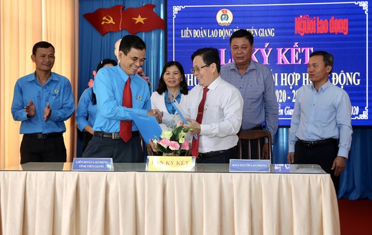 Báo Người Lao Động ký kết hợp tác với LĐLĐ tỉnh Tiền Giang - Ảnh 7.