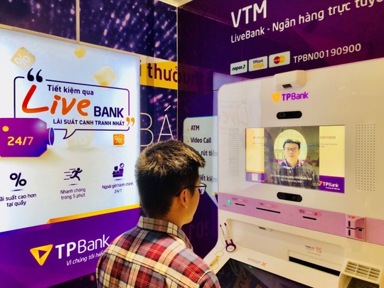 Ngân hàng Việt đầu tiên giao dịch bằng nhận diện khuôn mặt - Ảnh 1.