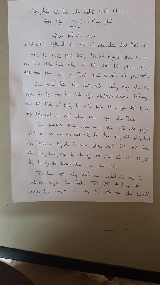 Đồng Nai: Người đàn ông quỳ giữa tòa xin xử án - Ảnh 3.