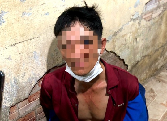 Tạm giữ đối tượng tình nghi liên quan cái chết bà chủ tiệm tạp hóa ở quận Tân Phú - Ảnh 1.