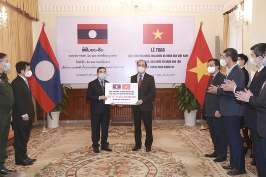  Việt Nam hỗ trợ khẩn cấp Lào hơn 2 triệu USD và vật tư y tế - Ảnh 1.