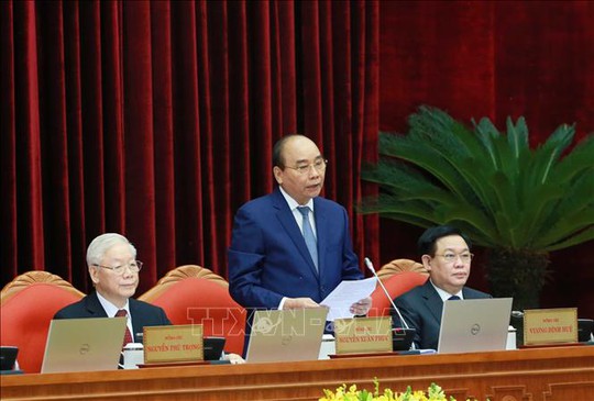 Chủ tịch nước Nguyễn Xuân Phúc điều hành phiên khai mạc Hội nghị Trung ương 4 - Ảnh 1.