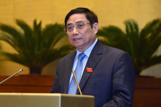 Thủ tướng Phạm Minh Chính lần đầu trả lời chất vấn - Ảnh 1.