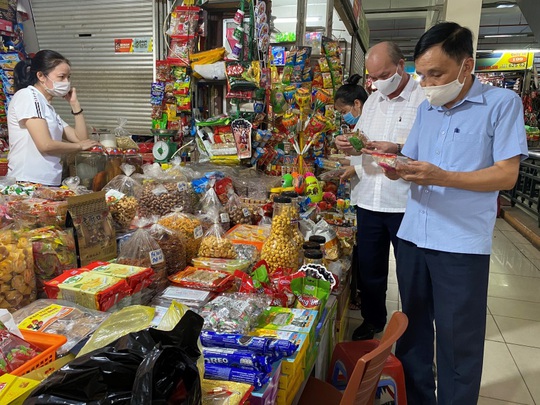 Giám sát mối nguy ô nhiễm thực phẩm tại một số chợ biên giới - Ảnh 1.