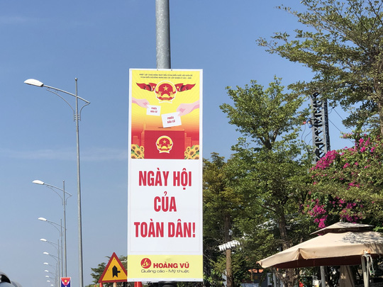 Đường phố rực cờ hoa, hơn 1,1 triệu cử tri Quảng Nam sẵn sàng đi bầu cử - Ảnh 21.