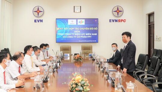 EVNSPC hợp tác FPT để số hóa hoạt động sản xuất kinh doanh - Ảnh 1.