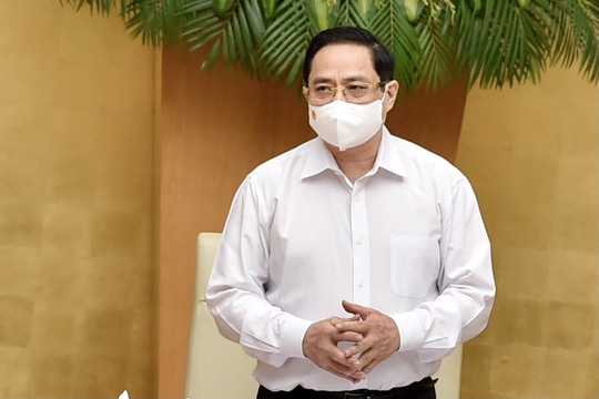 Thủ tướng Phạm Minh Chính: Xử lý nghiêm, kể cả xử lý hình sự việc lơ là chống dịch Covid-19 - Ảnh 1.