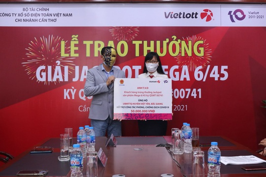 Vietlott ủng hộ Quỹ Vắc-xin phòng Covid-19 - Ảnh 2.