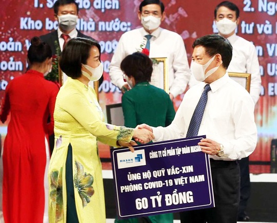 Masan trao tặng 60 tỉ đồng đến Quỹ vaccine phòng chống Covid-19 - Ảnh 1.