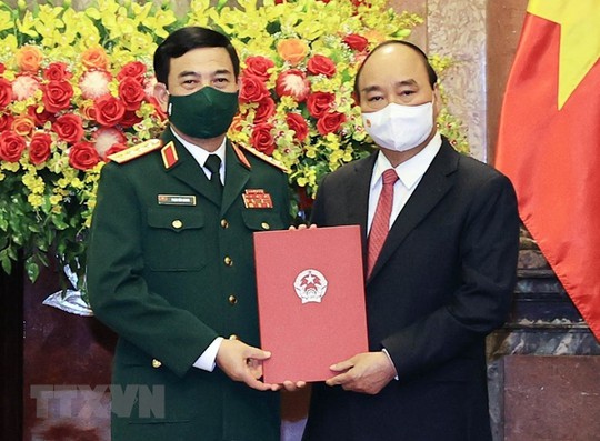 Bộ trưởng Quốc phòng Phan Văn Giang được thăng cấp bậc hàm Đại tướng - Ảnh 1.