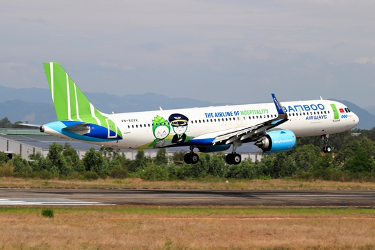 Các chuyến bay đặc biệt của Bamboo Airways đưa người dân Bình Định từ TP HCM về quê - Ảnh 1.