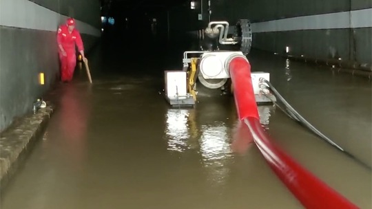 Bi kịch bên trong đường hầm Trung Quốc bị mưa lũ nhấn chìm - Ảnh 6.