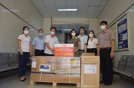 TNG Holdings Vietnam ủng hộ máy và 3.000 kit xét nghiệm PCR cho Hà Nội - Ảnh 2.