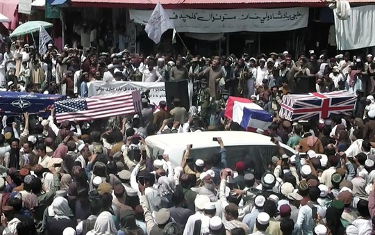 Taliban dịu giọng với Mỹ - Ảnh 1.
