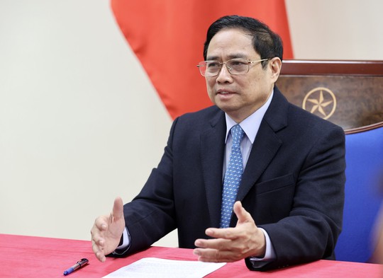 Thủ tướng Phạm Minh Chính và Thủ tướng Trung Quốc điện đàm, giải quyết vấn đề ách tắc hàng hóa tại cửa khẩu - Ảnh 1.
