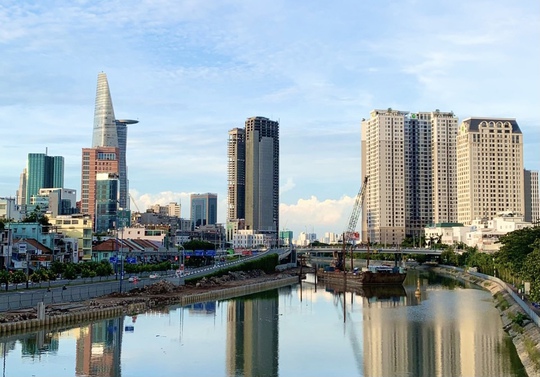 Tìm cách tháo gỡ khó khăn cho thị trường bất động sản TP HCM - Ảnh 1.