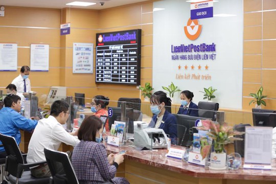 LienVietPostBank hỗ trợ giảm lãi suất vay vốn cho khách hàng doanh nghiệp - Ảnh 1.