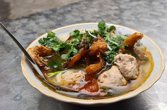 10 món ăn Việt được báo nước ngoài ca ngợi năm 2022 - Ảnh 9.