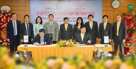 Vietcombank và Tổng Công ty Bưu điện Việt Nam hợp tác toàn diện - Ảnh 1.